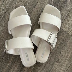 White buckle sandals